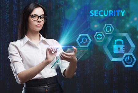 The concept of business, technology, the Internet and the network. A young entrepreneur working on a virtual screen of the future and sees the inscription: Securityの写真素材