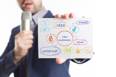 The concept of business, technology, the Internet and the network. Young businessman showing...