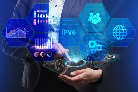 The concept of business, technology, the Internet and the network. A young entrepreneur working on a virtual screen of the future and sees the inscription: IPv6の写真素材