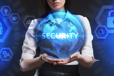 The concept of business, technology, the Internet and the network. A young entrepreneur working on a virtual screen of the future and sees the inscription: Securityの写真素材