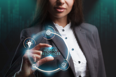 The concept of business, technology, the Internet and the network. A young entrepreneur working on a virtual screen of the future and sees the inscription: Human resourcesの写真素材
