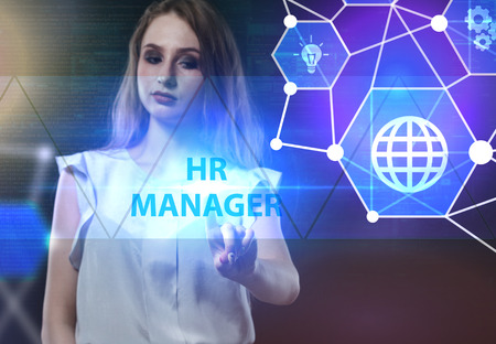 The concept of business, technology, the Internet and the network. A young entrepreneur working on a virtual screen of the future and sees the inscription: HR managerの写真素材