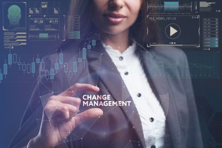 The concept of business, technology, the Internet and the network. A young entrepreneur working on a virtual screen of the future and sees the inscription: Change managementの写真素材