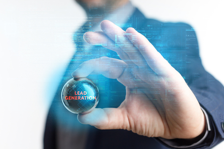 The concept of business, technology, the Internet and the network. A young entrepreneur working on a virtual screen of the future and sees the inscription: Lead generationの写真素材