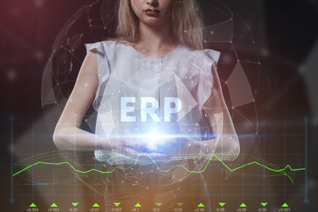 The concept of business, technology, the Internet and the network. A young entrepreneur working on a virtual screen of the future and sees the inscription: ERPの写真素材