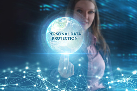 The concept of business, technology, the Internet and the network. A young entrepreneur working on a virtual screen of the future and sees the inscription: Personal data protectionの写真素材