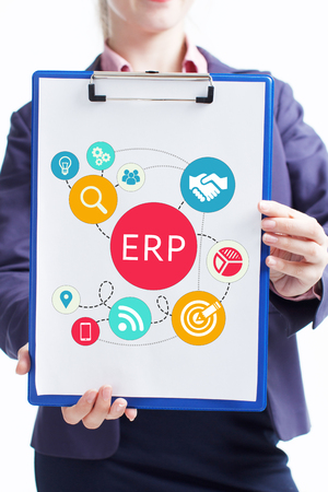 Business, technology, internet and networking concept. Young entrepreneur showing keyword: ERPの写真素材