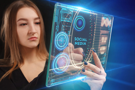 The concept of business, technology, the Internet and the network. A young entrepreneur working on a virtual screen of the future and sees the inscription: Social mediaの写真素材