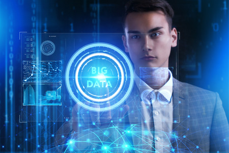 The concept of business, technology, the Internet and the network. A young entrepreneur working on a...