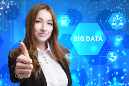 The concept of business, technology, the Internet and the network. A young entrepreneur working on a virtual screen of the future and sees the inscription: Big dataの写真素材