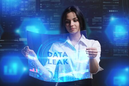 The concept of business, technology, the Internet and the network. A young entrepreneur working on a virtual screen of the future and sees the inscription: Data leakの写真素材