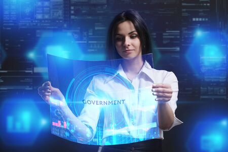 The concept of business, technology, the Internet and the network. A young entrepreneur working on a virtual screen of the future and sees the inscription: Governmentの写真素材