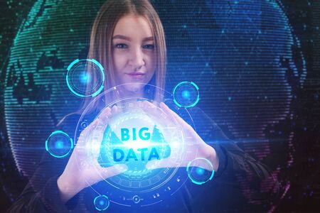 The concept of business, technology, the Internet and the network. A young entrepreneur working on a virtual screen of the future and sees the inscription: Big dataの写真素材