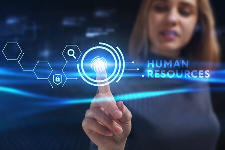 Business, Technology, Internet and network concept. Young businessman working on a virtual screen of the future and sees the inscription: Human resourcesの写真素材