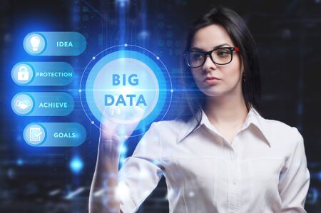 Business, Technology, Internet and network concept. Young businessman working on a virtual screen of the future and sees the inscription: Big dataの写真素材