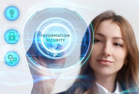 Business, Technology, Internet and network concept. Young businessman working on a virtual screen of the future and sees the inscription: Information securityの写真素材