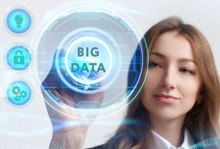 Business, Technology, Internet and network concept. Young businessman working on a virtual screen of the future and sees the inscription: Big dataの写真素材