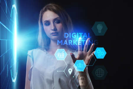 Business, Technology, Internet and network concept. Young businessman working on a virtual screen of the future and sees the inscription: Digital marketingの写真素材
