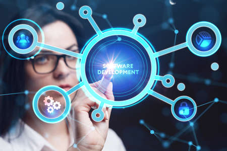 Business, Technology, Internet and network concept. Young businesswoman working on a virtual screen of the futureの写真素材