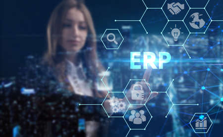 Business, technology, internet and network concept. Young businesswoman thinks over the steps for successful growth: ERPの写真素材