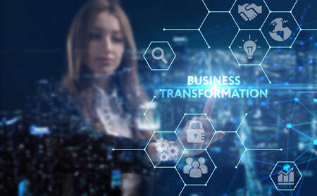 Business, technology, internet and network concept. Young businesswoman thinks over the steps for successful growth: Business transformationの写真素材