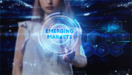 Business, technology, internet and network concept. Young businessman thinks over the steps for successful growth: Emerging marketsの写真素材