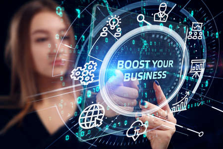 Business, Technology, Internet and network concept. Young businessman shows the word: Boost your businessの写真素材