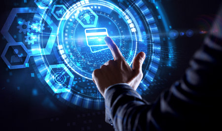 Concept of digital economy, e-payment, and online banking. Young businessman select the icon E-banking on the virtual display.の写真素材