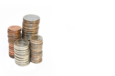 stack of coins over whiteの写真素材