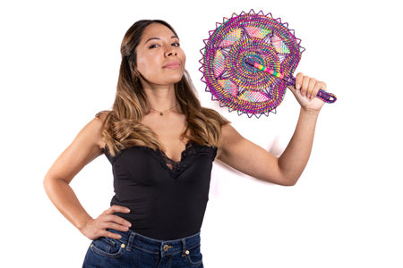 fanning latina woman posing camera with white backgroundの写真素材