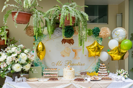 Baptism Celebration Table with Cake and Decorの写真素材