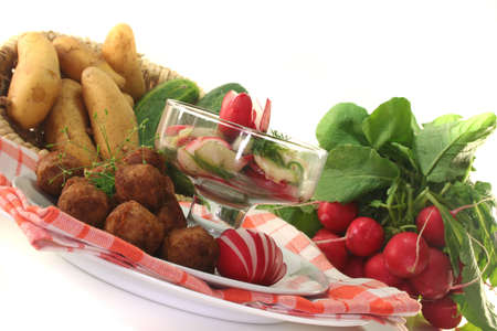 Koettbullar with Swedish cucumber-radish salad and dillの写真素材