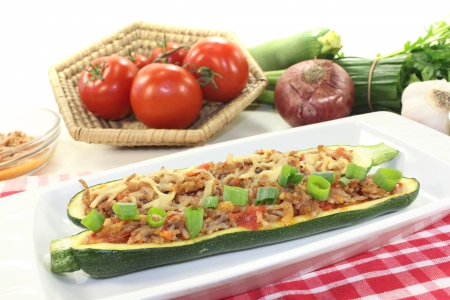 stuffed zucchini with ground beef on a light backgroundの写真素材
