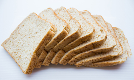 sliced bread isolated on white backgroundの写真素材
