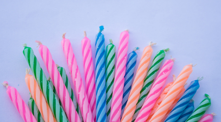 Birthday candles on white backgroundの写真素材