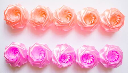 Rose   fower, crafts made of ribbon. On White background
