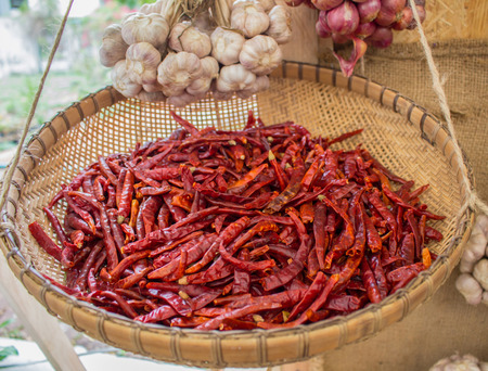 Hot red pepper in wooden basket