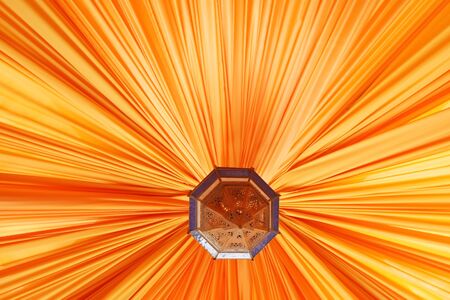 	Orange linen roof  Orange awning with a traditional Tunisian chandelierの写真素材