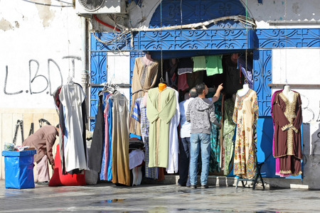 Tunis,Tunisia - September 14th, 2012   A clothing store full of typical tunisian clothes in the medina, famous marketplace of Tunis, Tunisia のeditorial素材