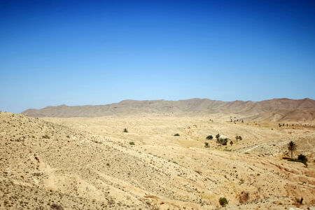Rocky Sahara desert in Matmata, Tunisia の写真素材