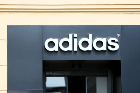 ZAGREB, CROATIA - FEBRUARY 24 : Adidas logo on the entrance of the shop on  February 24th, 2014 in Zagreb, Croatia. Adidas is a german manufacturer of sports equipment.のeditorial素材