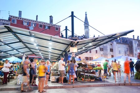 ROVINJ CROATIA  JULY 18 : People on a fruit and vegetable market in the town center on July 18th 2014 in Rovinj Croatia.のeditorial素材