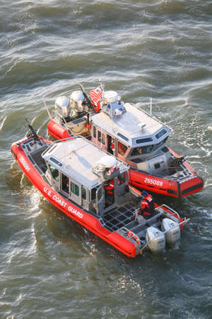 NEW YORK CITY, USA - APRIL 30 : A high angle view of two U.S. Coast Guard powerboats sailing in the...