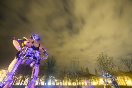 ZAGREB, CROATIA - MARCH 27, 2016 : Exhibition at night by Danilo Baletic named Transformers protecting Zagreb in Zagreb,Croatia. Exhibition is made of automobile parts and waste.のeditorial素材