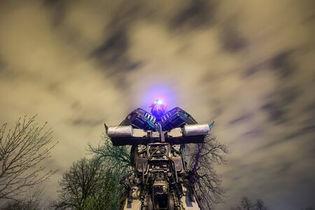 ZAGREB, CROATIA - MARCH 27, 2016 : Exhibition at night by Danilo Baletic named Transformers protecting Zagreb in Zagreb,Croatia. Exhibition is made of automobile parts and waste.のeditorial素材