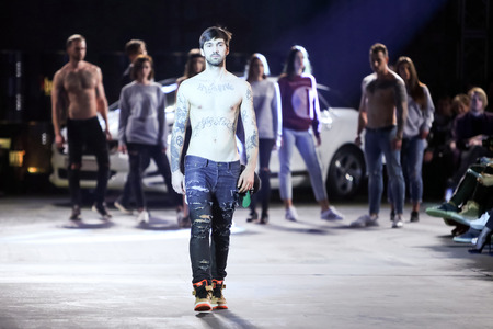 ZAGREB, CROATIA - APRIL 5, 2016 : Fashion model wearing clothes designed by Chipka by designers Tadija Glasnovic and  Nikola Zorotovic on the Cro a Porter fashion show in Zagreb, Croatia.のeditorial素材