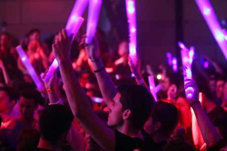 ZAGREB, CROATIA - APRIL 9, 2016 : The audience with illuminating sticks on La Fiesta Stage by Sensation party in Hypo center in Zagreb, Croatia.のeditorial素材