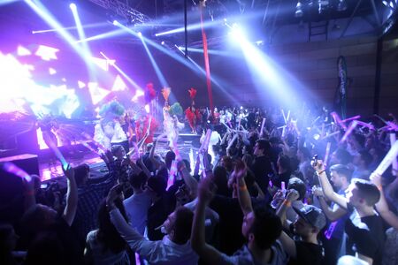 ZAGREB, CROATIA - APRIL 9, 2016 : The audience enjoying the performance of Cirque du Soleil dancers on La Fiesta Stage by Sensation party in Hypo center in Zagreb, Croatia.のeditorial素材