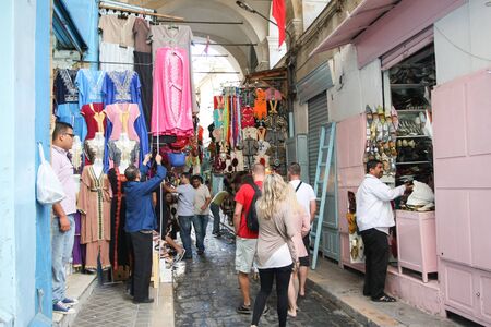TUNIS, TUNISIA - SEPTEMBER 14, 2012 : People walking in the streets of Medina, famous marketplace in Tunis,Tunisia.のeditorial素材