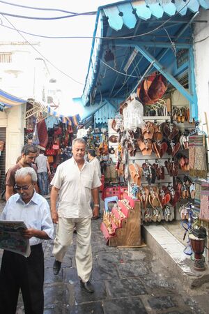 TUNIS, TUNISIA - SEPTEMBER 14, 2012 : People walking in the streets of Medina, famous marketplace in Tunis,Tunisia.のeditorial素材
